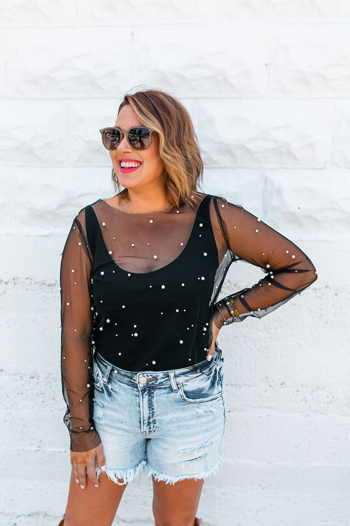 The Allison High Rise Distressed Denim Shorts