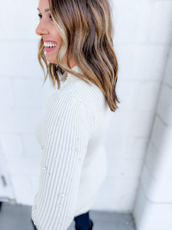 The Timeless Elegance Pearl Sweater Dress