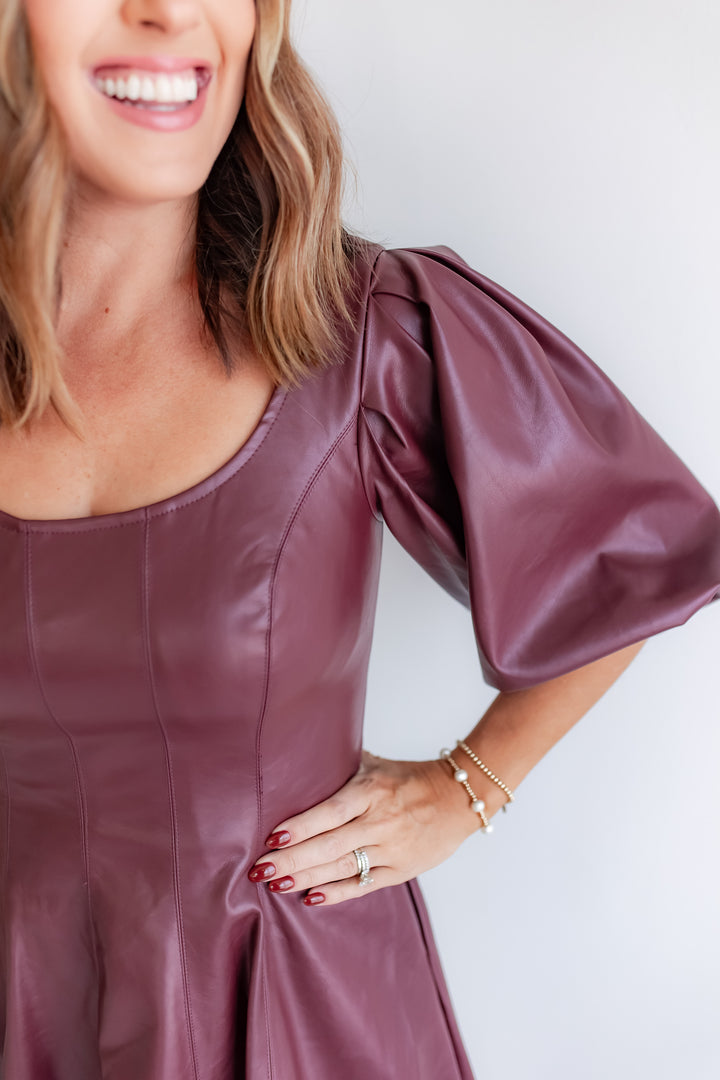 Chic wine leather dress with 3/4 puff sleeves