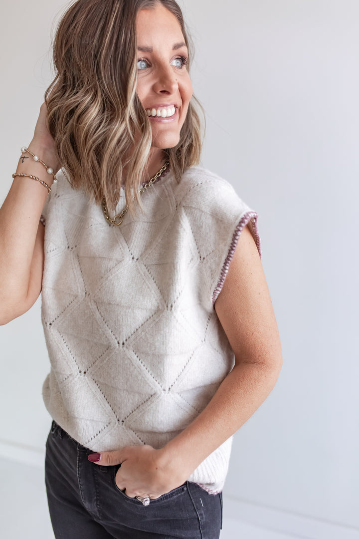 Women’s cream knit sweater with contrast wine trim