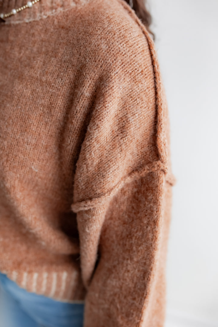 The Low Sun Mockneck Sweater