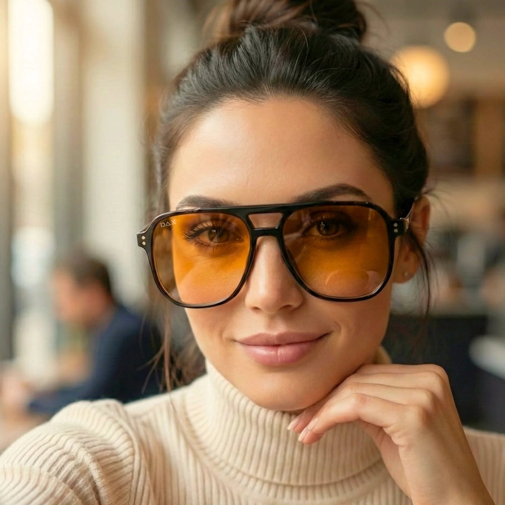 Skye sunglasses in Amber on a model