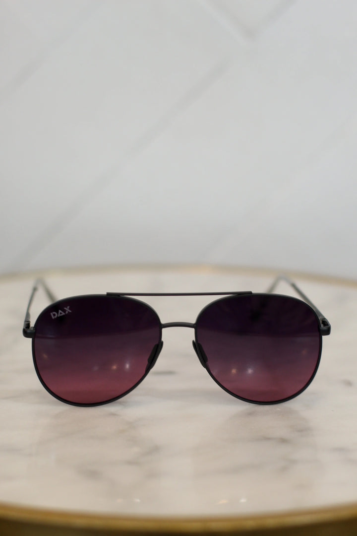 Aviator sunglasses with dark lenses