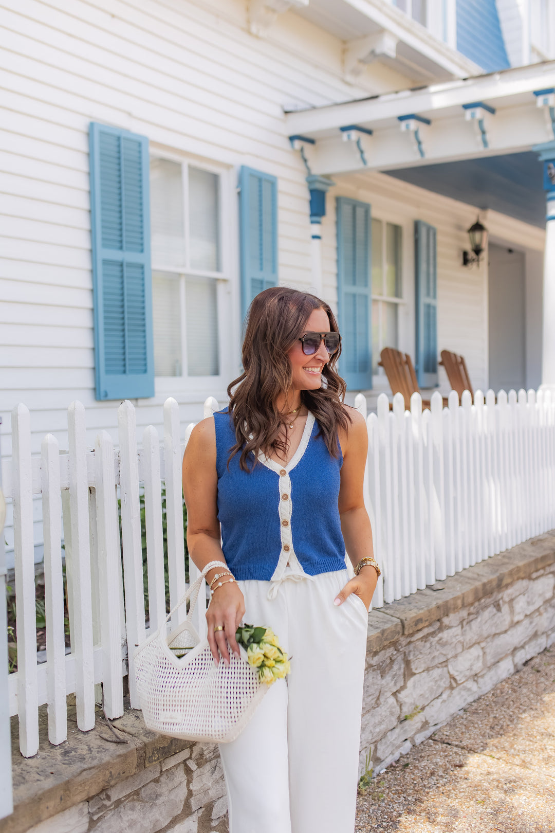 Blue knit tank top for women styled with wide leg pants for a summer outfit