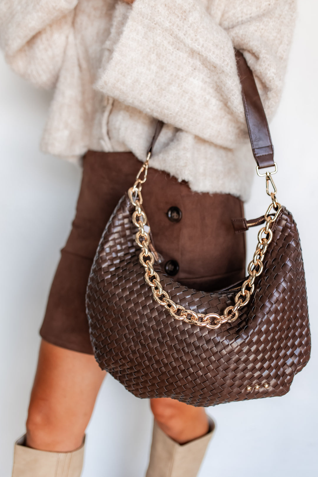 Brown woven shoulder bag with gold chain strap