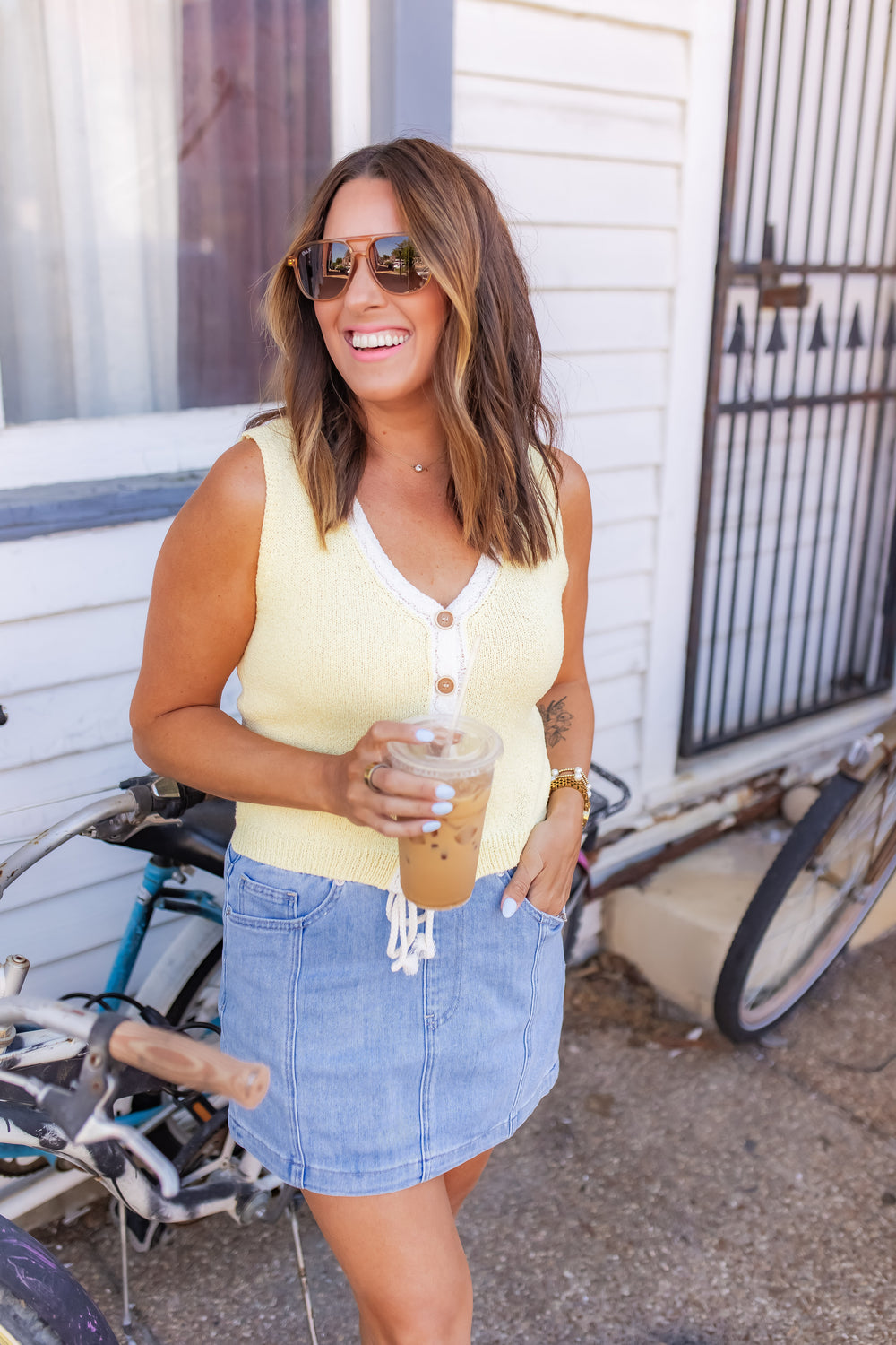 Denim pull-on mini skirt for women styled with yellow top for casual summer outfit