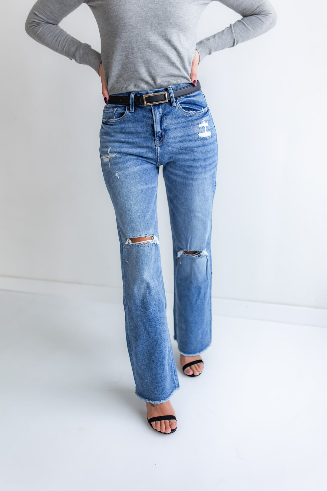 Model wearing Mica wide leg jeans in dark wash.