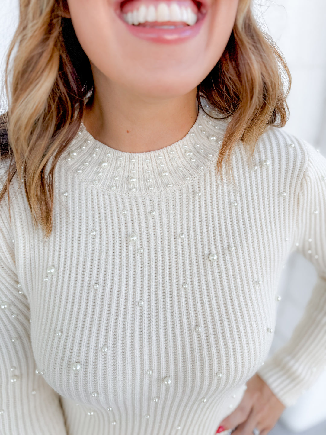 Women’s cream knit dress with pearl detailing