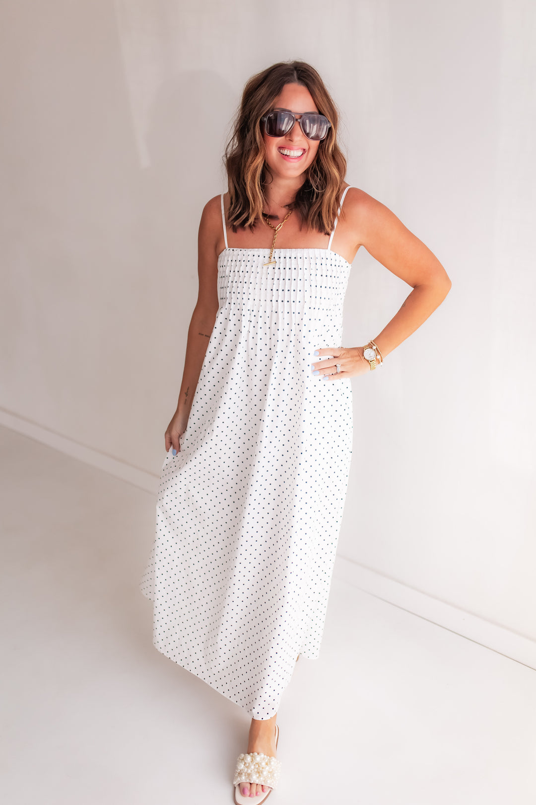 white polka dot maxi dress with spaghetti straps