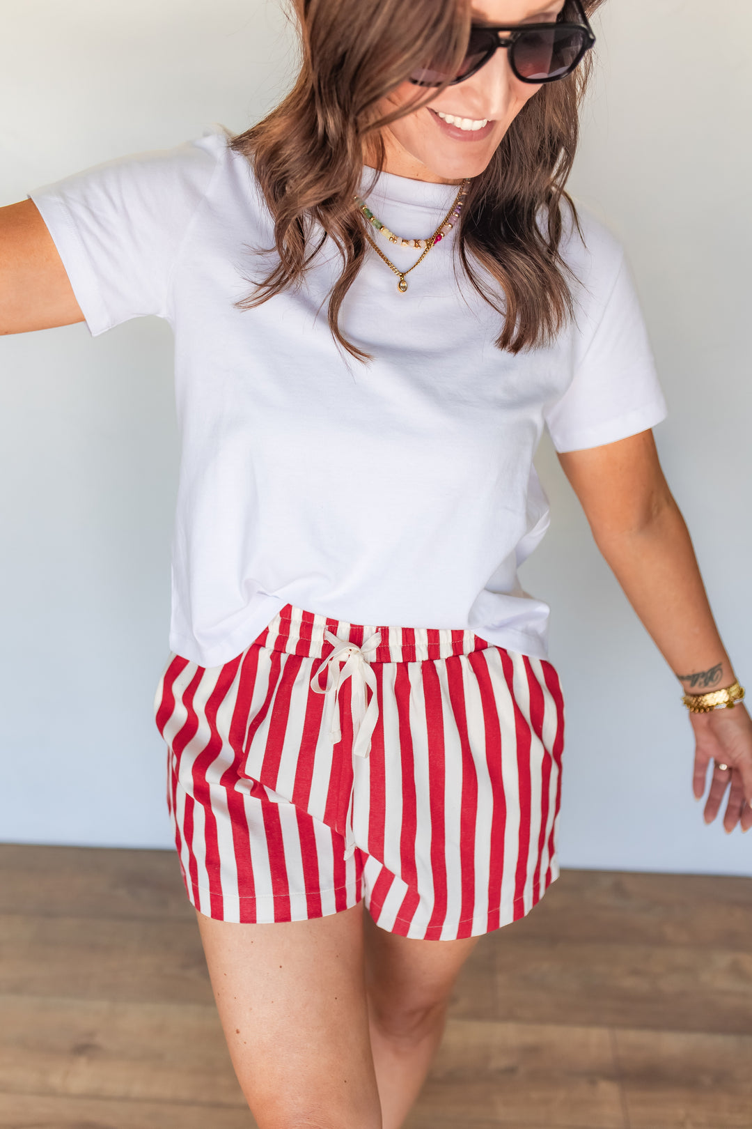 Patriotic red striped shorts with elastic waistband and tie detail