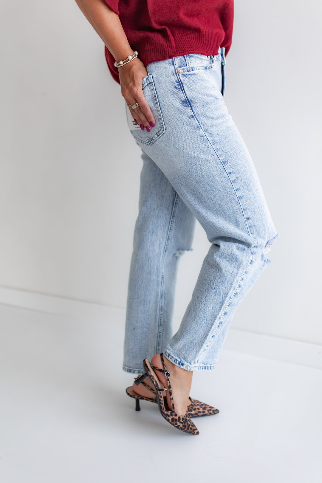 Slim straight light wash Mica denim for everyday wear - side view of jeans.