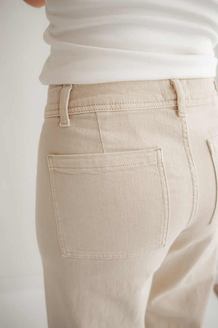 Wide leg denim pants styled for office or casual wear