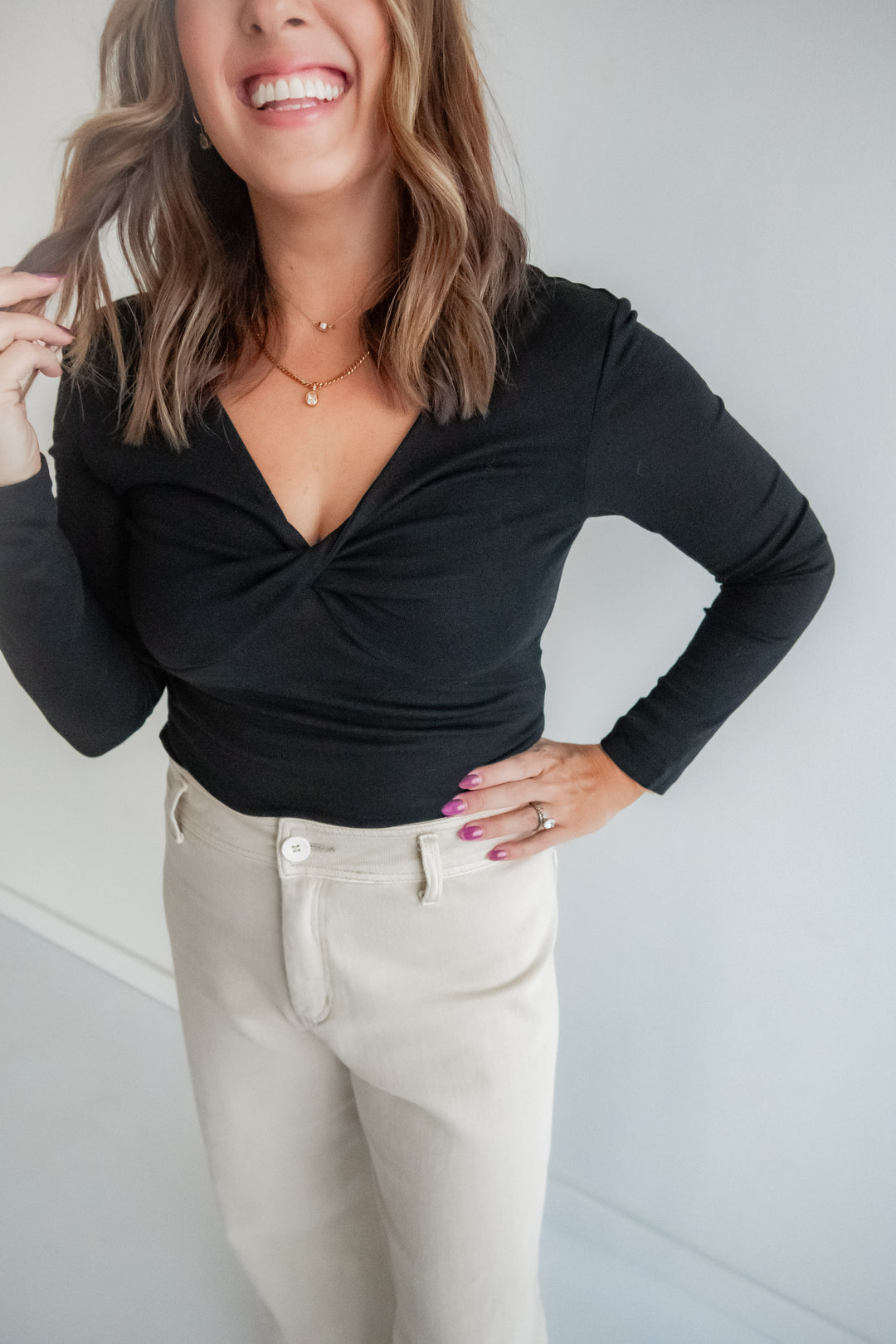 Women’s black layering top with feminine fit