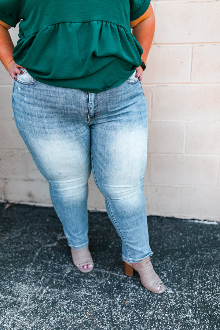 One Eleven Olive Boutique The Arissa Medium Wash Denim - Curvy 
These jeans are LIFE! A great amount of stretch, soft fabric and very mild distressing. You will want to live in them this season and your next OEO jean obsession! 