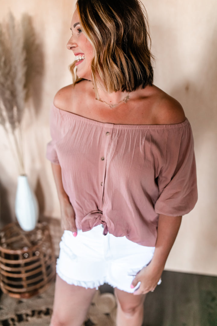 One Eleven Olive Boutique The Brielle Blouse You'll be turning all the heads when you're wearing the Brielle Blouse! This cute top is designed with an ultra light material. It features an elastic neckline which
