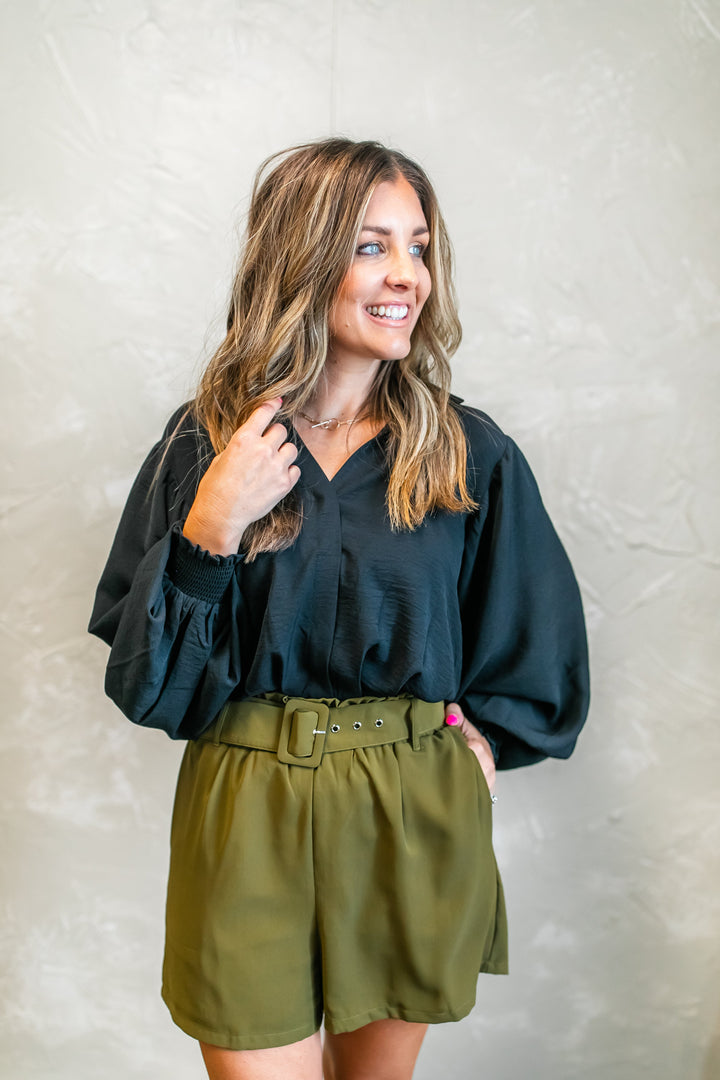One Eleven Olive Boutique The Carmen Blouse - Black This gorgeous gal will be a go to this fall transition. The look of a bodysuit without actually being a bodysuit!You can go from the office to date night and everyth