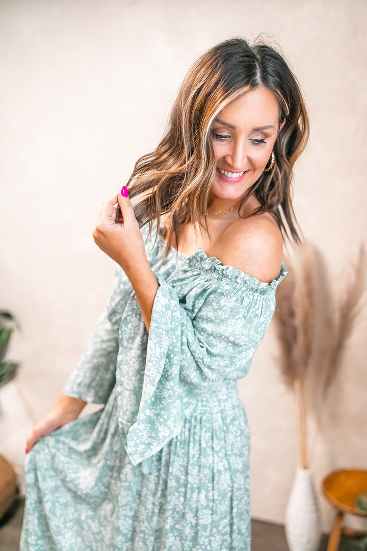 One Eleven Olive Boutique The Flora Off the shoulder top The Flora off the shoulder top is too cute by herself but pairs perfectly with The Flora midi skirt to give the look of a dress. The cute top can be worn on or off t