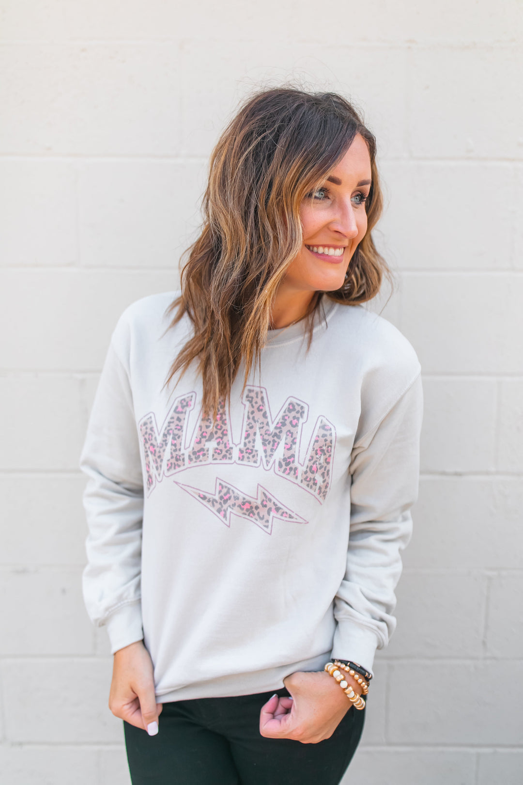 One Eleven Olive Boutique The Leopard Mama Sweatshirt 
Hey mamas! Do we have a cozy sweatshirt for you!! The pink leopard adds some sass and the neutral goes with all the things! Trust us, you will want to live in it! 
