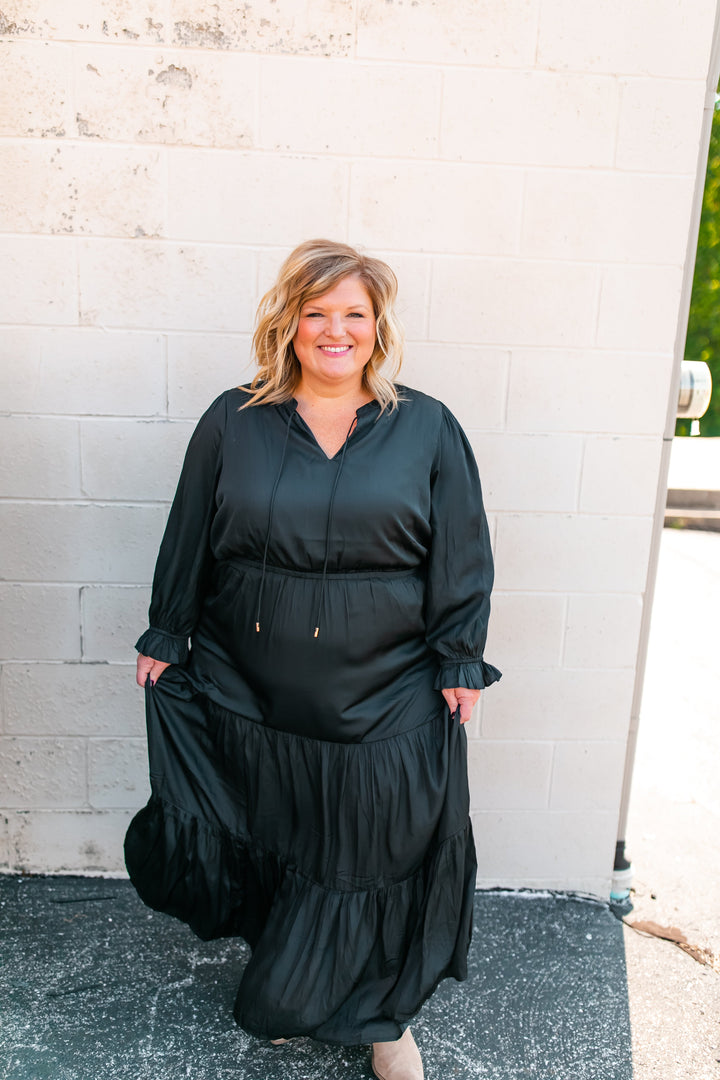 One Eleven Olive Boutique The Marlee Dress - Black (XS - 3XL) Black satin is sooo much better than regular plain black, amiright?! A classic piece that will be perfect for family pictures, weddings, and everything in between th