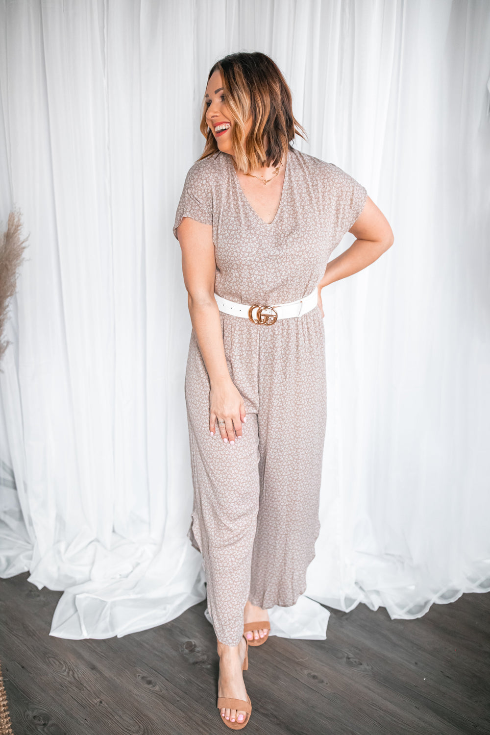 One Eleven Olive Boutique The Oakley Jumpsuit The Oakley jumpsuit is perfect for this spring and summer! Belt it with one of our belts and pair with sandals or heels depending on if dressing up or down! The back