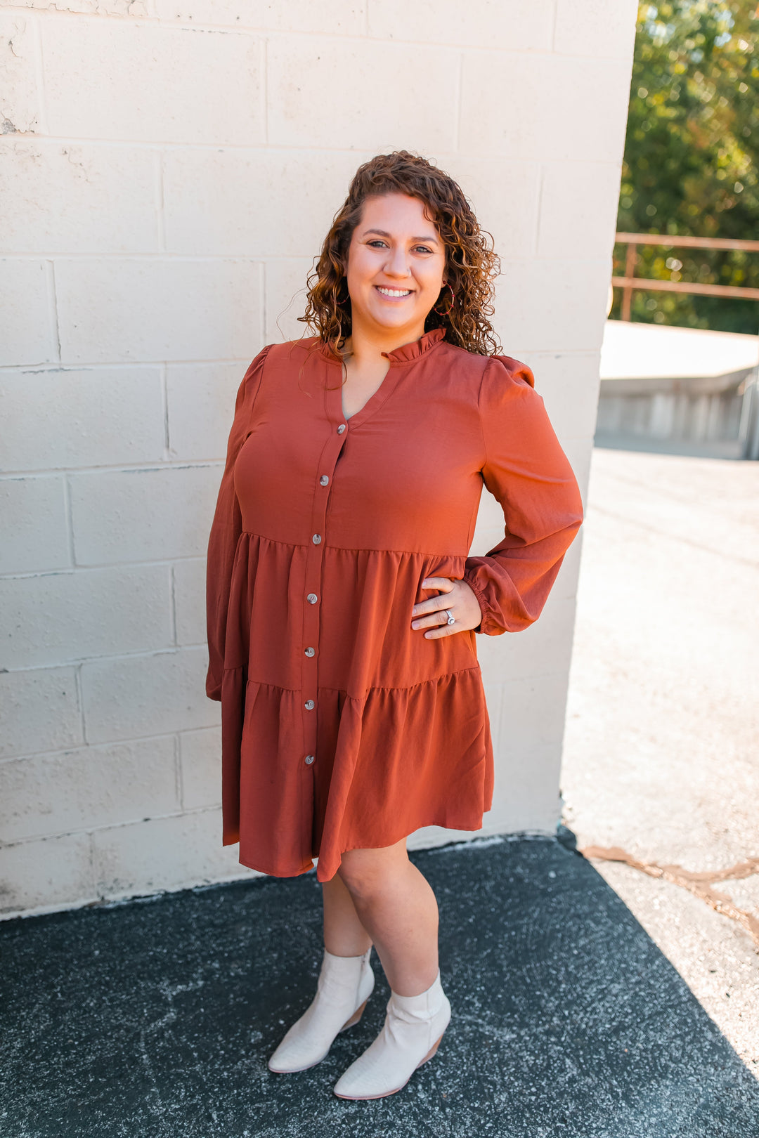 One Eleven Olive Boutique The Riley Button Up Dress (S-2XL) - Camel If you are in need of a flattering and easy throw together outfit, look no further than the Riley Button Up Dress! The color, the tiers, the buttons..the pockets! It