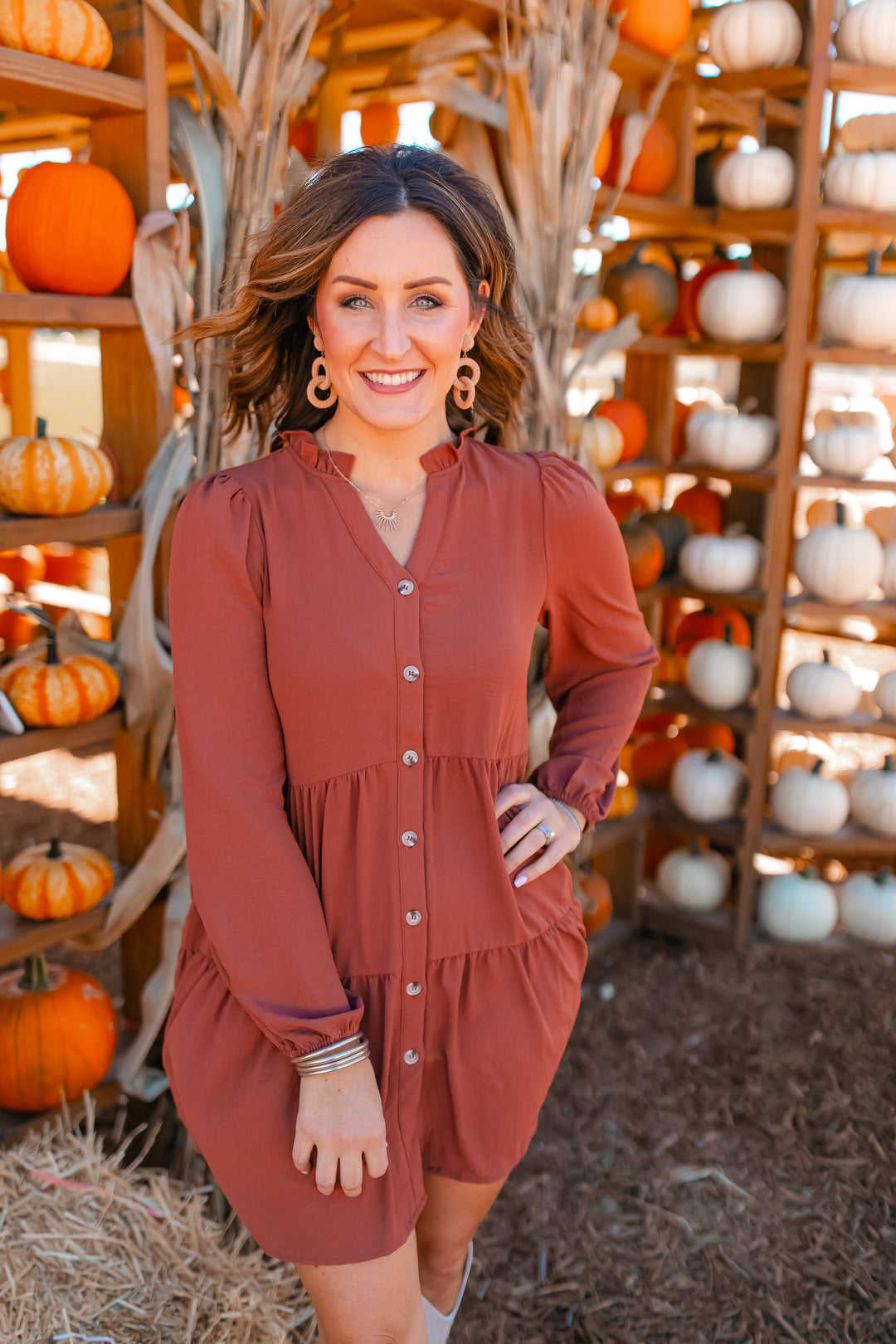 One Eleven Olive Boutique The Riley Button Up Dress (S-2XL) - Camel If you are in need of a flattering and easy throw together outfit, look no further than the Riley Button Up Dress! The color, the tiers, the buttons..the pockets! It